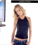girl with hands in jeans, head tilted towards an LCD panel